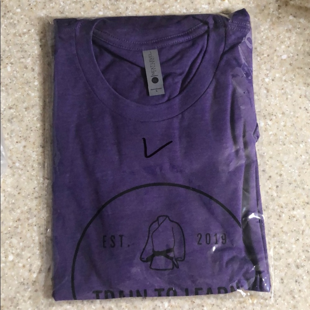 Train to learn apparel™️ T-shirt